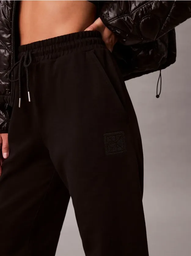 Black بنطال رياضي خفيف للركض من قماش تيري فاخر بقصة واسعة